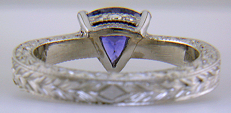 Inside view of platinum hand-engraved ring with trillium color change sapphire.