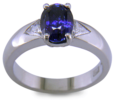 Sapphire and trilliant diamond handcrafted platinum ring. (J7416)