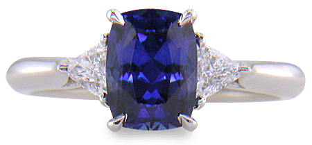Hand-crafted sapphire and diamond platinum ring. (J8596) 