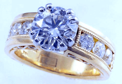 Gold and platinum engagement ring with ideal cut diamonds.