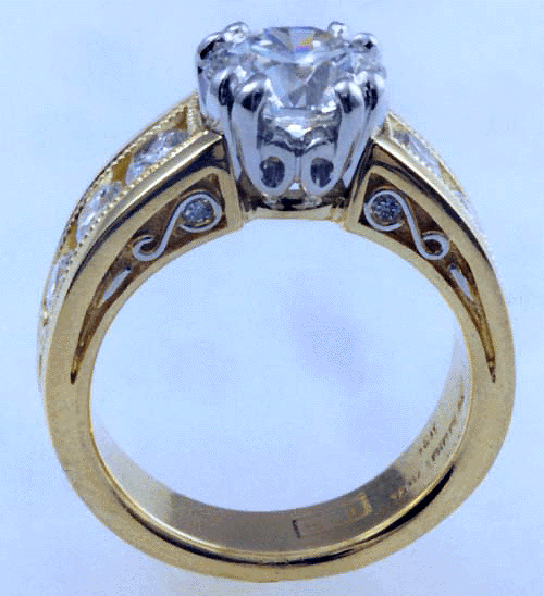 Side view of engagement ring with ideal cut diamonds.