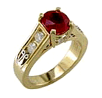 Custom designed Burmese ruby and diamond engagement rings in 18kt gold.