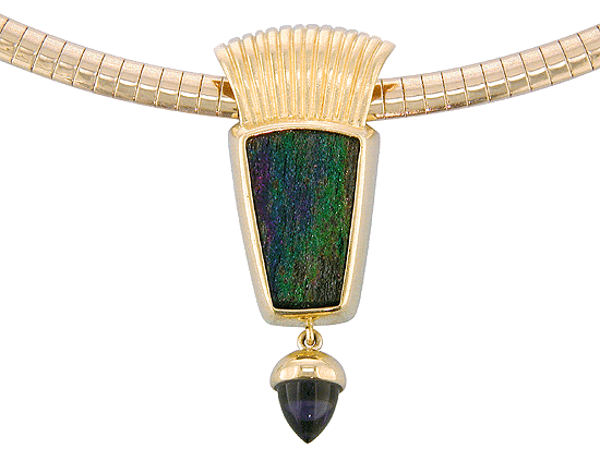 Rainbow Hematite pendant with an Iolite drop crafted in 18kt gold.