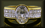 18kt gold engagement ring with oval center diamond and 16 princess-cut diamonds.
