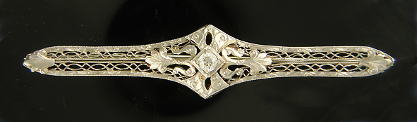 Edwardian brooch set with a sparking Old European Cut diamond. (J3853)