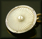 Edwardian platinum and pearl cufflinks with 18kt gold backs. (J6506)