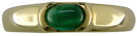Emerald cabochon set in 18kt gold ring.