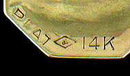 Close up of precious metal and maker marks. (J6770)