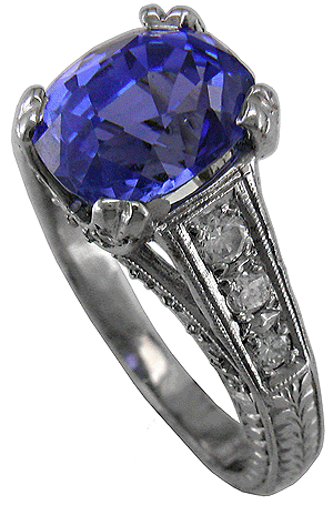 Estate sapphire and platinum ring with diamonds.