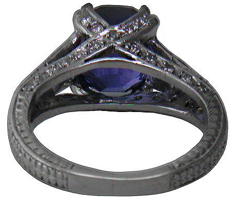 Side view of estate sapphire and platinum ring.