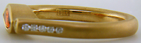 Close-up of Bijoux Extraordinaire's hallmark (BEL). (J6421)