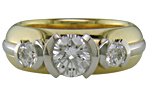 Platinum and yellow gold diamond ring.