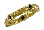 Richly carved 18kt gold band with five sparkling sapphires.