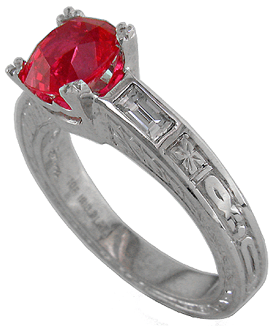 Platinum ring with flame red spinel and baguette diamonds.