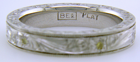 Close up of Bijoux Extraordinaire hallmark, 'BEL'.