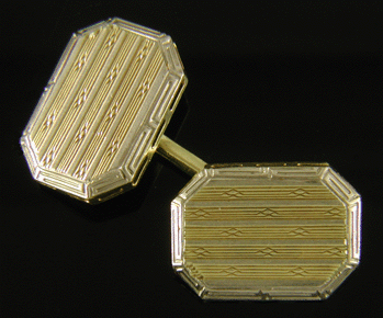 Elegant two-tone Art Deco cufflinks crafted in 14kt gold. (J7430)