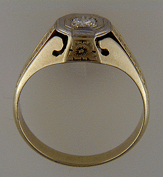 Gent's antique diamond ring crafted in 14kt gold.