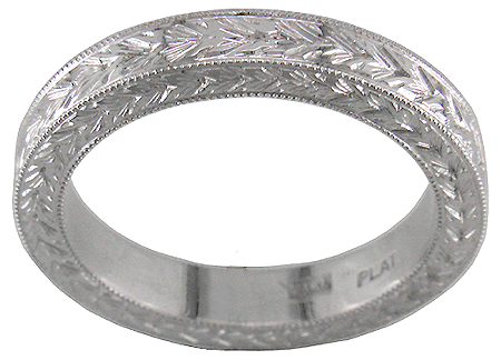 Hand engraved man's wedding band crafted in platinum.