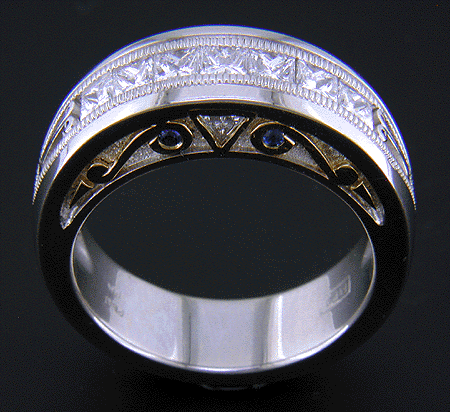 Custom wedding ring with seven princess-cut diamonds.