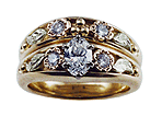 Custom engagement rings set with diamonds and crafted in yellow, rose and green gold.