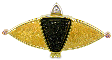 Custom brooch featuring drusy Psilomelane with fancy pink and yellow diamonds in 24 kt yellow gold.