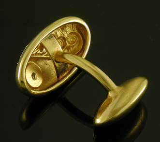 Art Nouveau diamond and scroll cufflinks. (J9315)