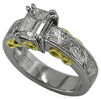 Hand-engraved platinum and gold ring with an emerald cut diamond.