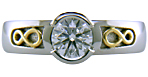 Custom platinum diamond ring with 18kt infinity symbols.