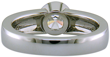 Inside of custom platinum diamond ring with 18kt infinity symbols.