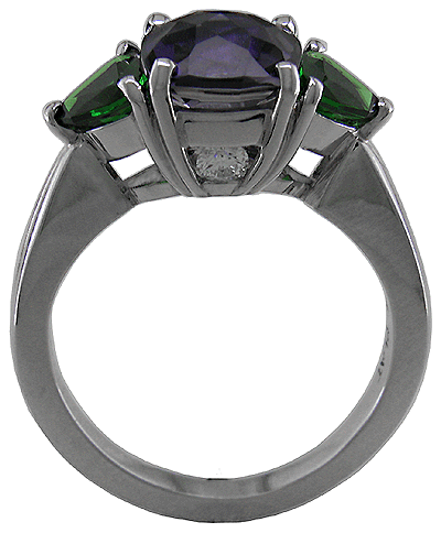 Side view of iolite and tourmaline ring crafted in platinum.