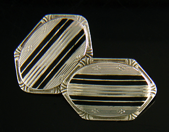 Elegant white gold and black enamel cufflinks. (J8602)