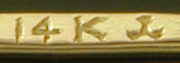 Close-up of Krementz gold purity mark and maker's mark. (D9524)
