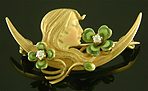 Krementz Art Nouveau brooch of serene woman and clover. (J9090)