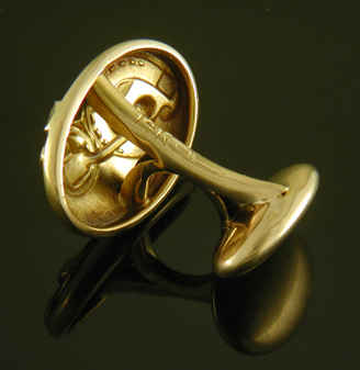 Larter Art Nouveau lucky cufflinks crafted in 14kt gold. (9533)