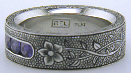 Close up of Bijoux Extraordinaire hallmark, 'BEL'.