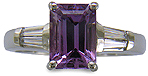 Lavender Sapphire set with tapered baguette diamonds in a hand-crafted platinum ring. (J8527)