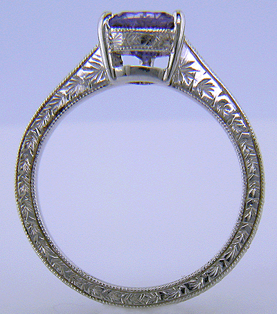 Side view of platinum engraved ring with trillium lavender sapphire. (J6399)
