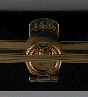 Close of metal mark and collapsible bail. (J5335)