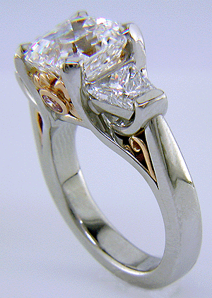 Shoulder view of handcrafted platinum ring with Asscher cut diamond.