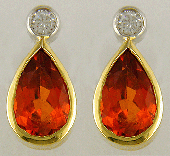 Mandarin garnet and diamond earrings hand crafted in 18kt gold.