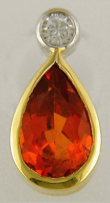 Mandarin garnet and diamond earrings hand crafted in 18kt gold. (J8520)