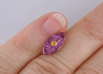 Purple sapphire with Mandarin garnet. (CS8704)
