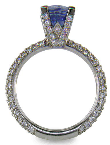 Side view of Sapphire and pave diamond platinum ring. (J8426)