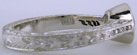 Close-up of Bijoux Extraordinaire (BEL) hallmark. (J8544)