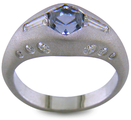 Hand-crafted Montana Sapphire and baguette diamond ring crafted in platinum. (J8433)
