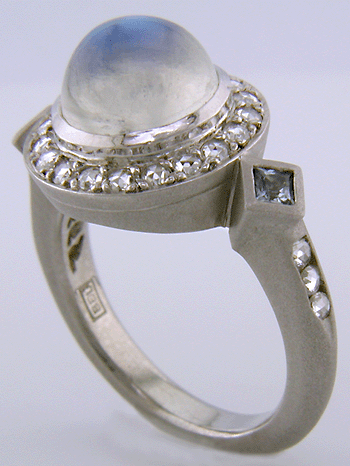 Moonstone and Rose-cut Diamond ring custom crafted in platinum. (J8519)