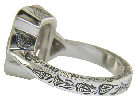 White and Lavender Sapphires in a hand-engraved platinum ring.