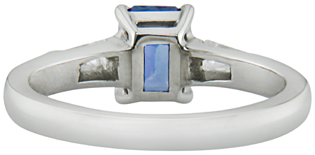 Inside view of Morph-cut Sapphire with tapered baguette diamonds in a custom platinum ring. (J8545)