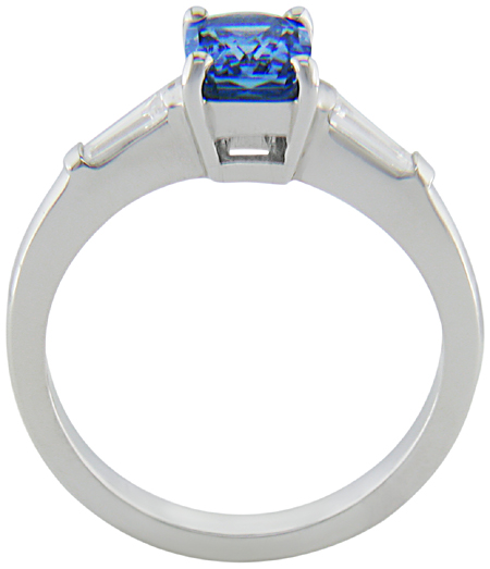 Morph-cut Sapphire with tapered baguette diamonds in a custom platinum ring. (J8545)