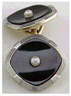 Cufflinks and stud set featuring onyx and pearls set in 14kt gold. (J5131)